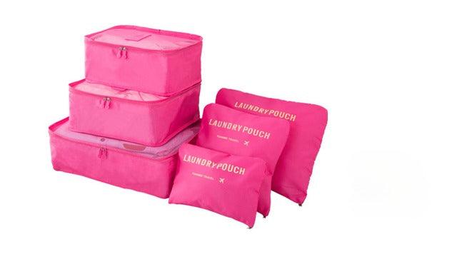 Detalhe do zíper resistente do Kit Organizador de Malas para Viagem, garantindo durabilidade. Cor rosa.