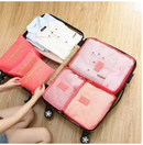 Kit Organizador de Malas para Viagem lavável, garantindo higiene e reutilização contínua. Cor rosa.