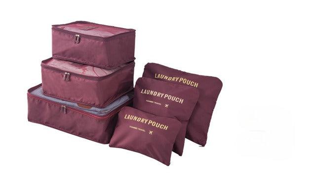 Organizadores de malas compactas, ideais para economizar espaço e facilitar viagens. Cor vinho.