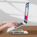 Suporte para Laptop transformando um espaço de trabalho em um ambiente mais ergonômico e eficiente.